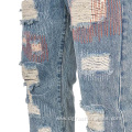 Washed Ripped Flare Stacked Leg Jeans Trousers